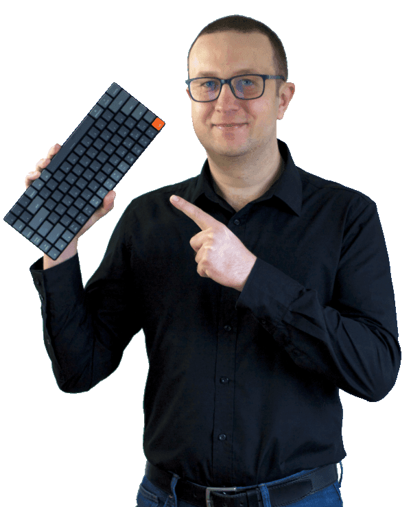 Picture of Marcin Ślęzak with a low-profile mechanical keyboard